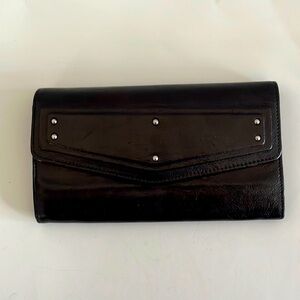 Yves Saint Luarent women long wallet black, leather. Italy